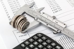 Danville Credit Card Debt Management Canva Coins and Calculator on a Invoice 1 300x200